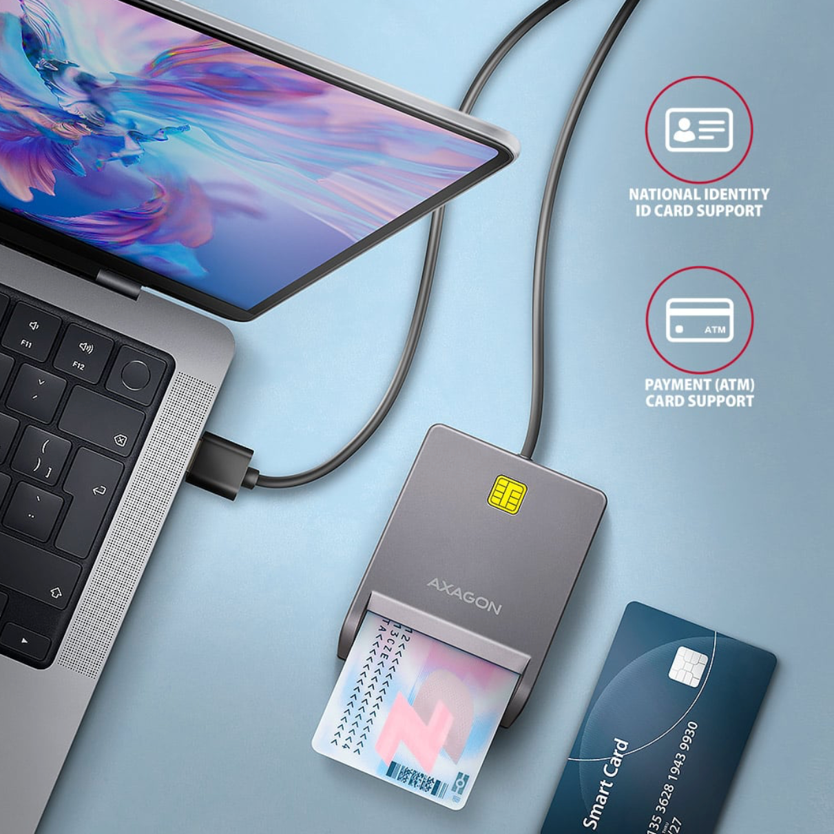 Card reader device with a laptop on a light blue background